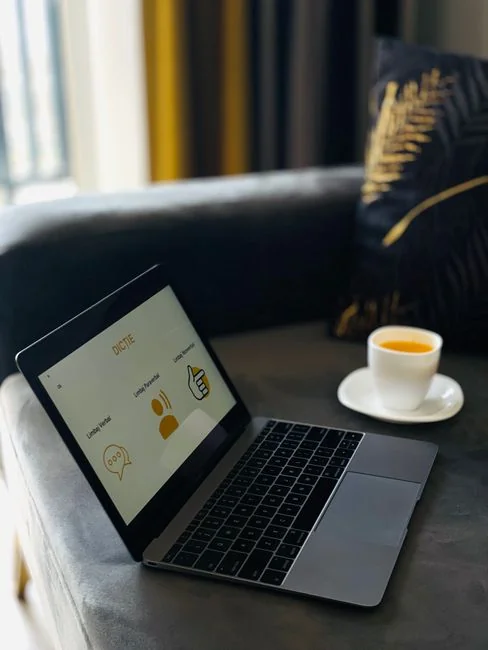 A sleek, efficient workspace with several monitors, a laptop, and a smartphone, highlighting a web design project.